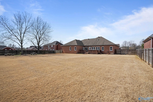 view of yard featuring a fenced backyard