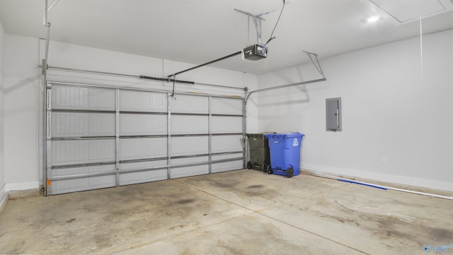 14801 Demarie Ln, Athens, AL 35611 - garage with a garage door opener, baseboards, and electric panel