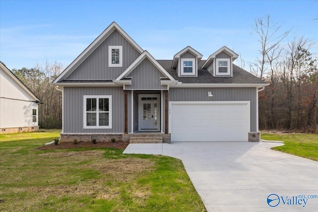 view of front of house featuring a garage, driveway, roof with shingles, a front lawn, and board and batten siding