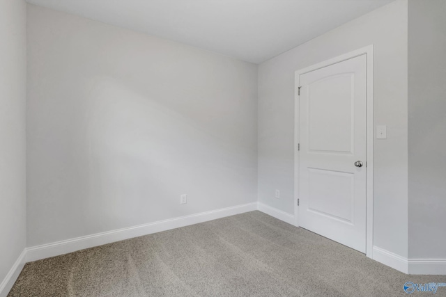 unfurnished room with carpet