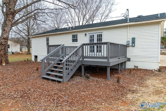 back of house featuring a deck