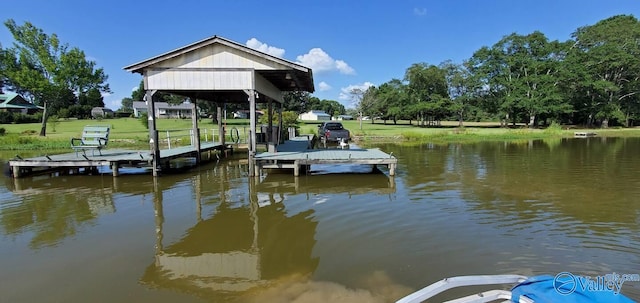 dock area featuring a water view