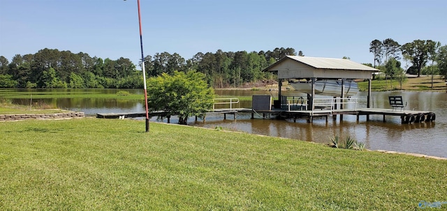 dock area featuring a yard, boat lift, and a water view