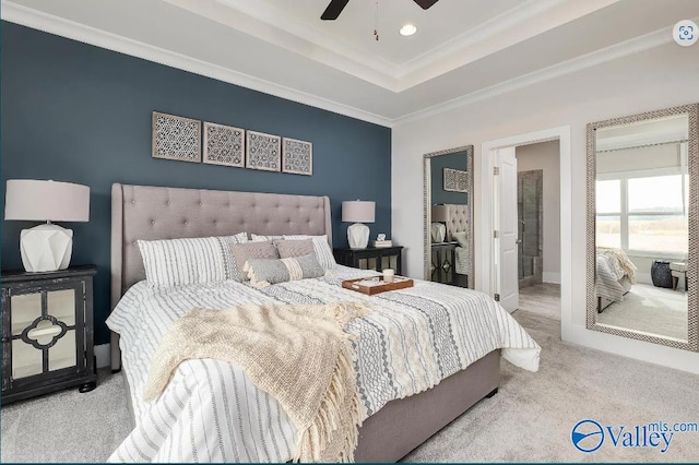 bedroom with ornamental molding, ceiling fan, and light colored carpet