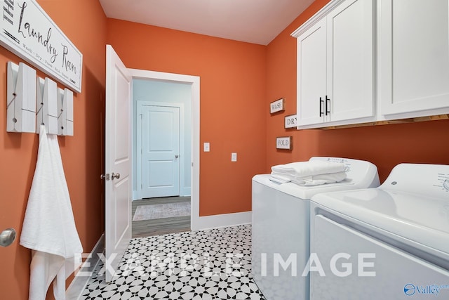 laundry room with cabinets and independent washer and dryer