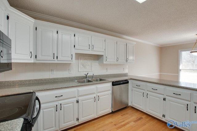 kitchen with white cabinetry, a sink, light wood-style flooring, and stainless steel dishwasher