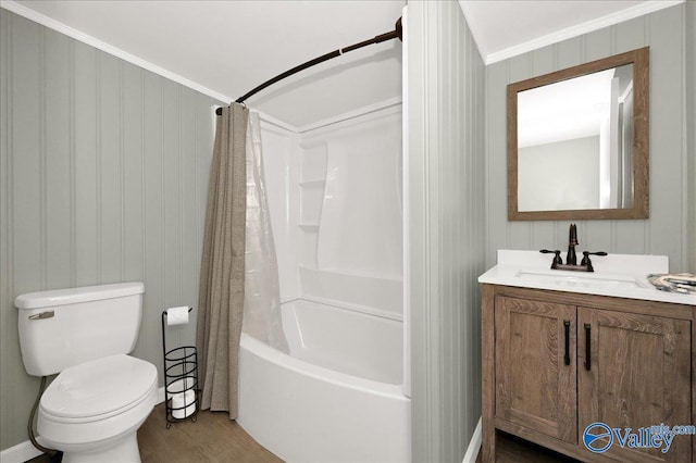 full bath with toilet, wood finished floors, vanity, shower / bath combination with curtain, and crown molding