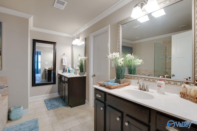 bathroom featuring vanity, tile patterned floors, ornamental molding, and a shower with door