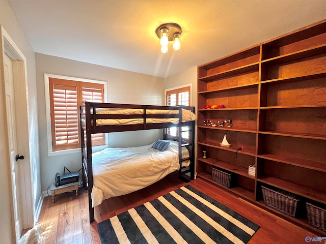 bedroom featuring dark hardwood / wood-style floors