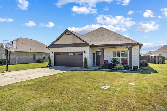 22584 Big Oak Dr, Athens, AL 35613 - view of front of property featuring fence, a front lawn, central AC, concrete driveway, and an attached garage