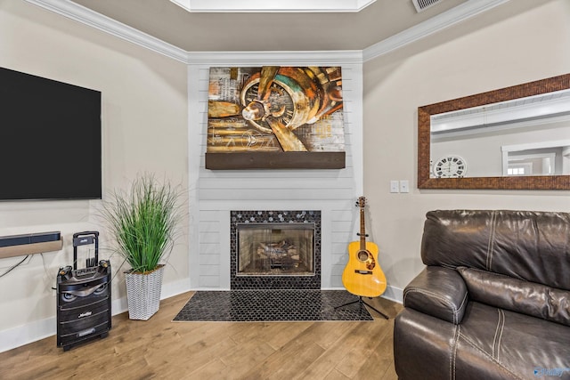 22584 Big Oak Dr, Athens, AL 35613 - living room with baseboards, ornamental molding, wood finished floors, and a fireplace