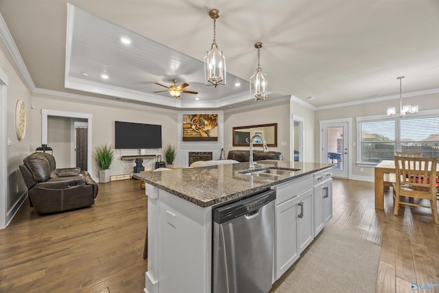 22584 Big Oak Dr, Athens, AL 35613 - kitchen with ceiling fan with notable chandelier, open floor plan, dishwasher, and a sink