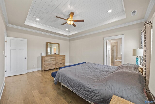 22584 Big Oak Dr, Athens, AL 35613 - bedroom with baseboards, visible vents, crown molding, hardwood / wood-style floors, and a raised ceiling