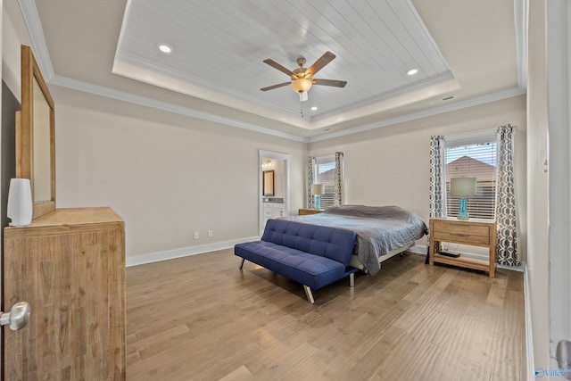 22584 Big Oak Dr, Athens, AL 35613 - bedroom featuring multiple windows, wood finished floors, and a tray ceiling