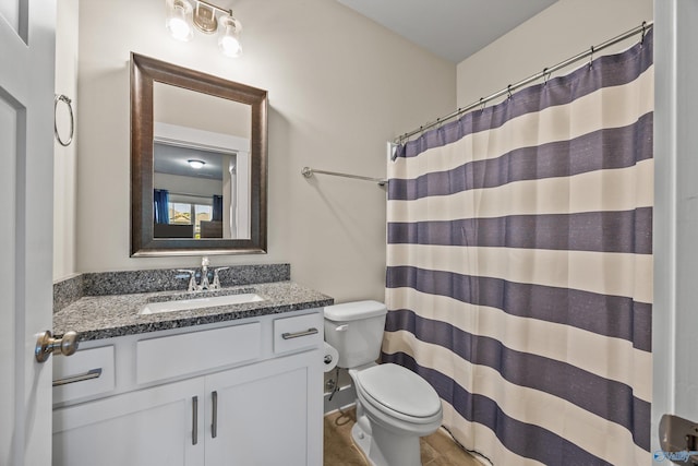 22584 Big Oak Dr, Athens, AL 35613 - bathroom featuring vanity, a shower with shower curtain, and toilet