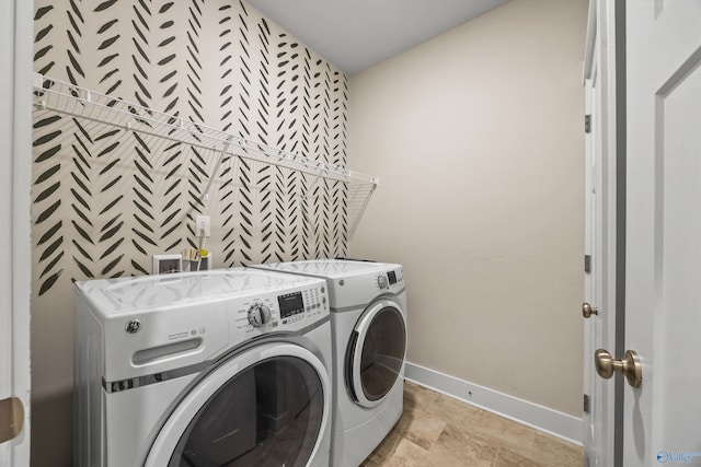 22584 Big Oak Dr, Athens, AL 35613 - laundry room featuring washing machine and clothes dryer, laundry area, and baseboards