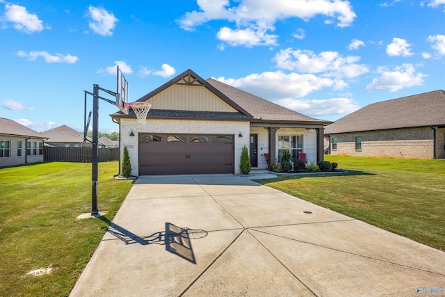 22584 Big Oak Dr, Athens, AL 35613 - view of front facade featuring concrete driveway, an attached garage, fence, a front yard, and brick siding