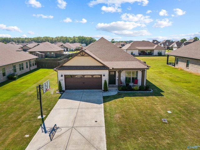 22584 Big Oak Dr, Athens, AL 35613 - view of front of house featuring a residential view, an attached garage, a front yard, and driveway