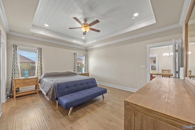 22584 Big Oak Dr, Athens, AL 35613 - bedroom featuring light wood finished floors, baseboards, recessed lighting, crown molding, and a raised ceiling