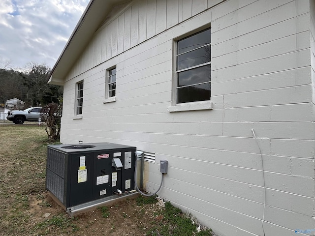 view of side of property with cooling unit