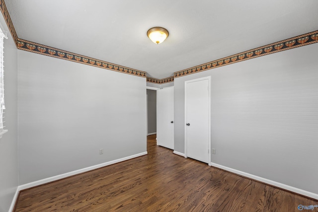 interior space with dark hardwood / wood-style flooring