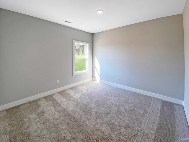 spare room with carpet flooring