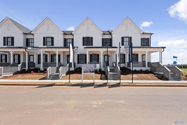 119 Moss Brook Ln, Madison, AL 35757 - townhome / multi-family property featuring a porch and board and batten siding