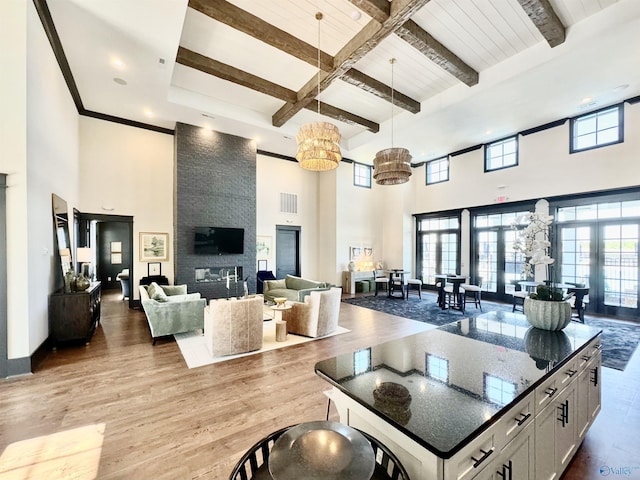 119 Moss Brook Ln, Madison, AL 35757 - common area with a high ceiling and beamed ceiling