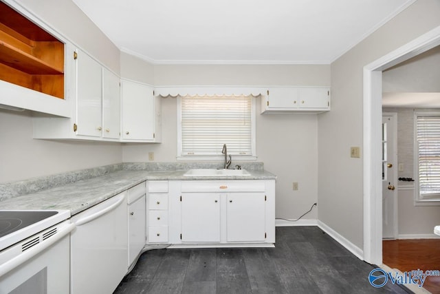 kitchen featuring dark wood finished floors, white appliances, white cabinetry, and a sink