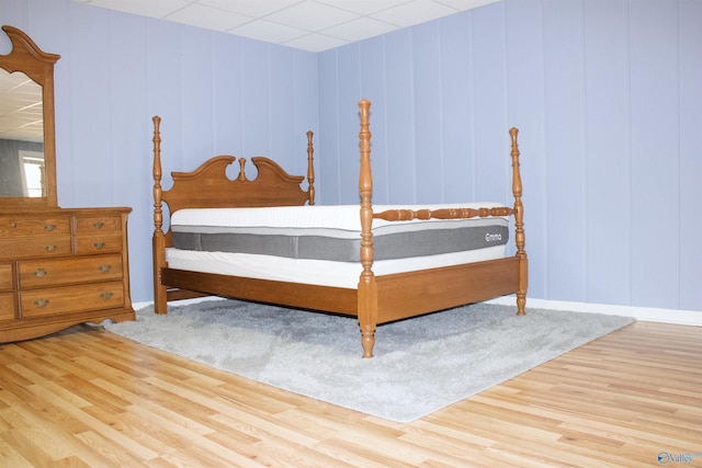 bedroom with wood-type flooring