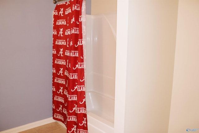 interior space featuring shower / bath combo with shower curtain