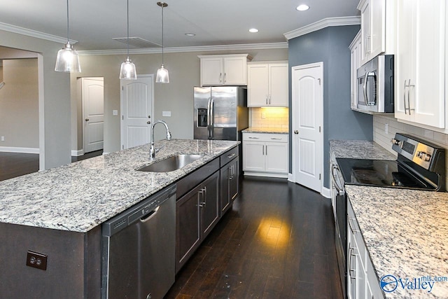 kitchen with a kitchen island with sink, sink, white cabinets, and stainless steel appliances