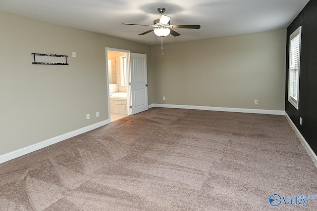 carpeted empty room with ceiling fan