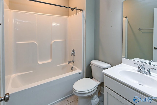 full bathroom featuring tile patterned floors, vanity, toilet, and bathtub / shower combination