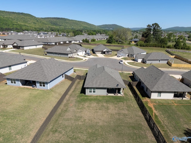 drone / aerial view with a mountain view and a residential view