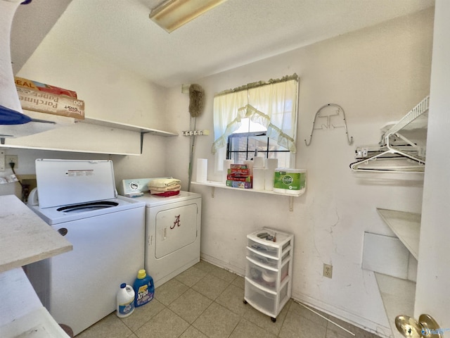 washroom with washer and dryer