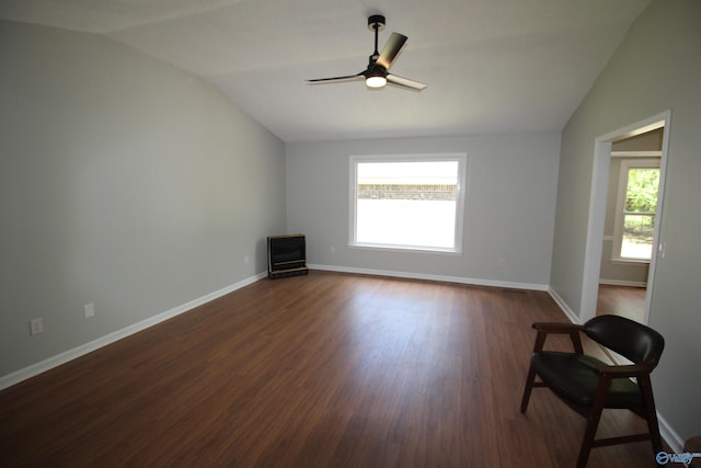 195 Holly Lynn Ln, Hazel Green, AL 35750 - unfurnished living room featuring lofted ceiling, plenty of natural light, dark wood-style flooring, and baseboards