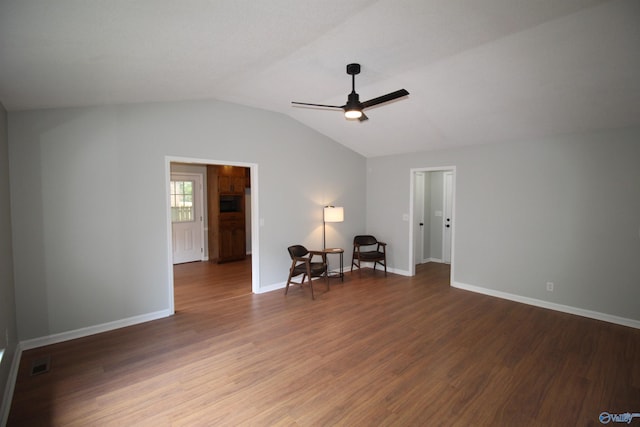 195 Holly Lynn Ln, Hazel Green, AL 35750 - unfurnished room featuring ceiling fan, wood finished floors, lofted ceiling, and baseboards