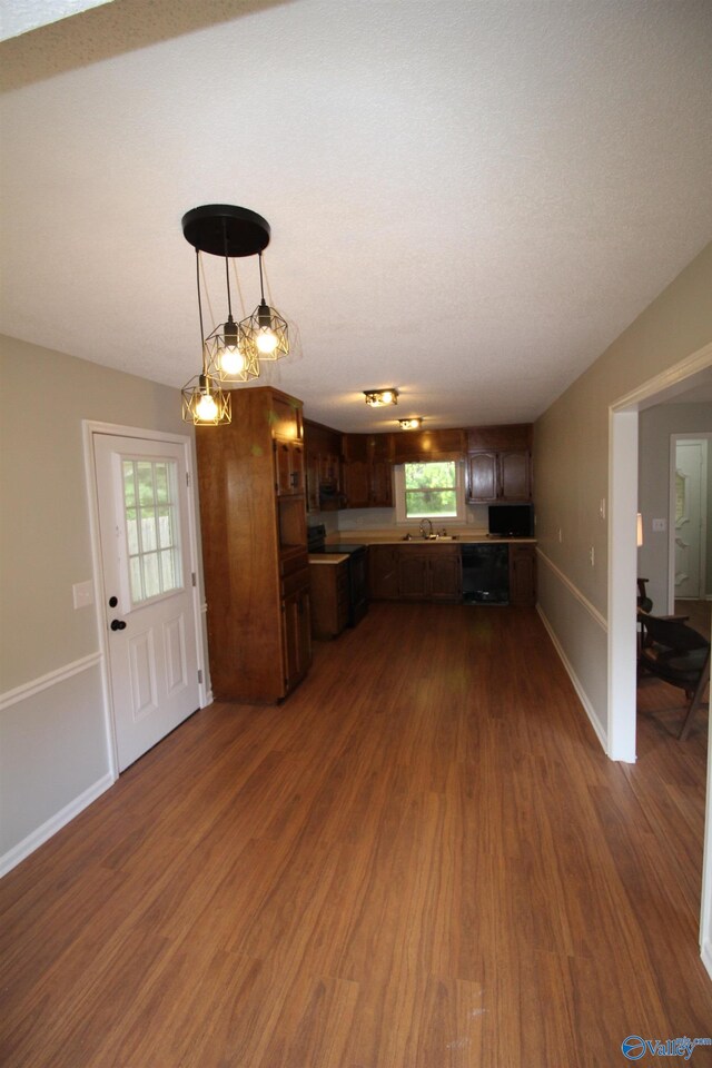 195 Holly Lynn Ln, Hazel Green, AL 35750 - kitchen with dark wood finished floors, light countertops, plenty of natural light, and a sink
