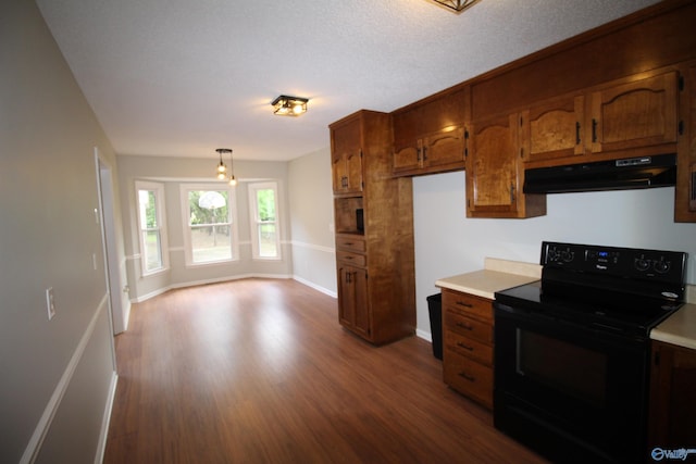 195 Holly Lynn Ln, Hazel Green, AL 35750 - kitchen featuring black range with electric stovetop, range hood, light countertops, brown cabinets, and dark wood-style flooring