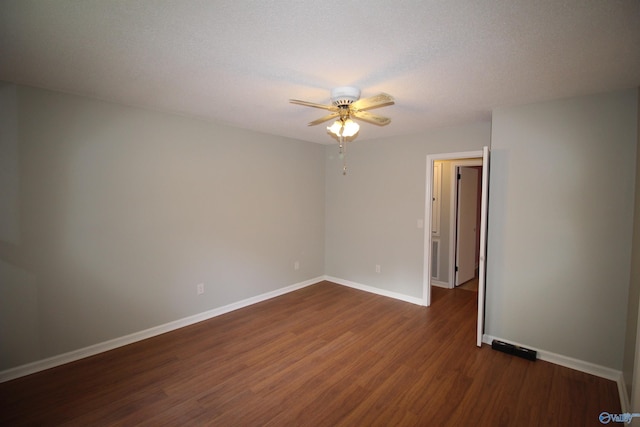 195 Holly Lynn Ln, Hazel Green, AL 35750 - spare room with a ceiling fan, dark wood-style floors, and baseboards
