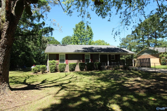 195 Holly Lynn Ln, Hazel Green, AL 35750 - ranch-style home with a porch, a gate, and brick siding