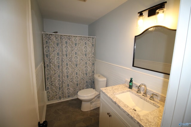 195 Holly Lynn Ln, Hazel Green, AL 35750 - full bath featuring vanity, a wainscoted wall, and toilet