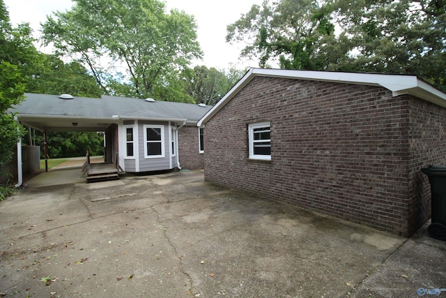 195 Holly Lynn Ln, Hazel Green, AL 35750 - view of side of property featuring brick siding and driveway