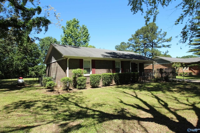 195 Holly Lynn Ln, Hazel Green, AL 35750 - view of front of property featuring brick siding and a front lawn