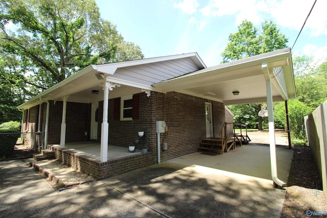 195 Holly Lynn Ln, Hazel Green, AL 35750 - view of property exterior with concrete driveway and brick siding