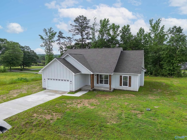 55 Edgewood St, Rainsville, AL 35986 - view of front of property with board and batten siding, a garage, a front lawn, concrete driveway, and a shingled roof