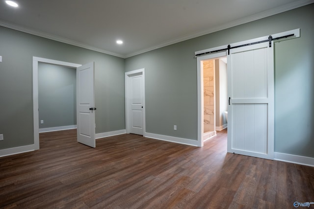 55 Edgewood St, Rainsville, AL 35986 - unfurnished bedroom featuring a barn door, crown molding, recessed lighting, dark wood finished floors, and baseboards