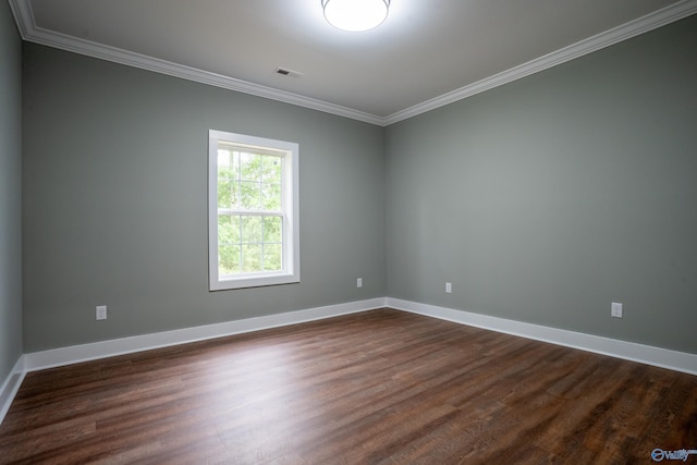55 Edgewood St, Rainsville, AL 35986 - spare room featuring crown molding, dark wood-style floors, and baseboards