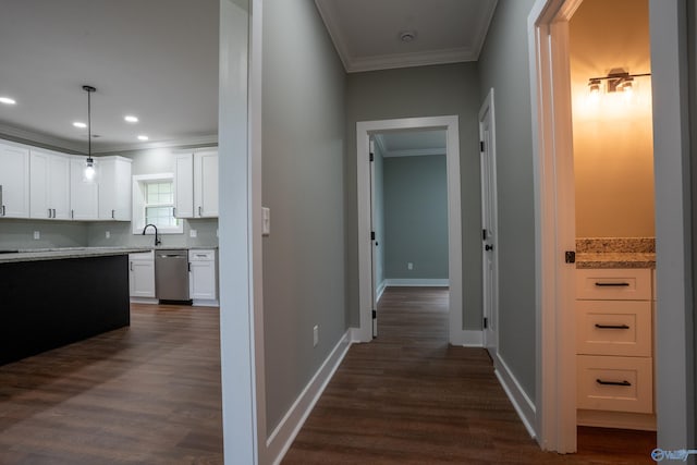 55 Edgewood St, Rainsville, AL 35986 - corridor with crown molding, dark wood-type flooring, baseboards, a sink, and recessed lighting